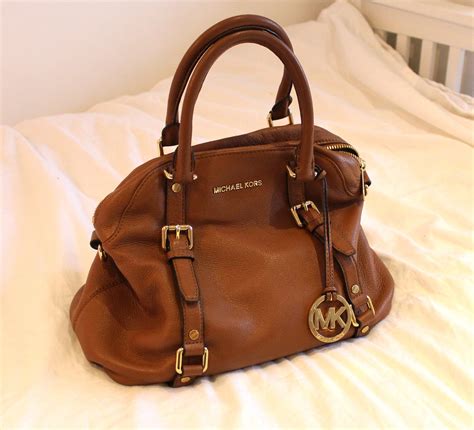 used michael kors purse price|sell used michael kors handbags.